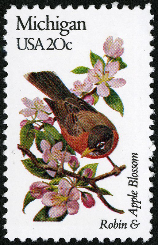 Sello Petirrojo y Manzano en flor. Serie de sellos Pájaros y flores del estado, correspondiente a Michigan (1982).