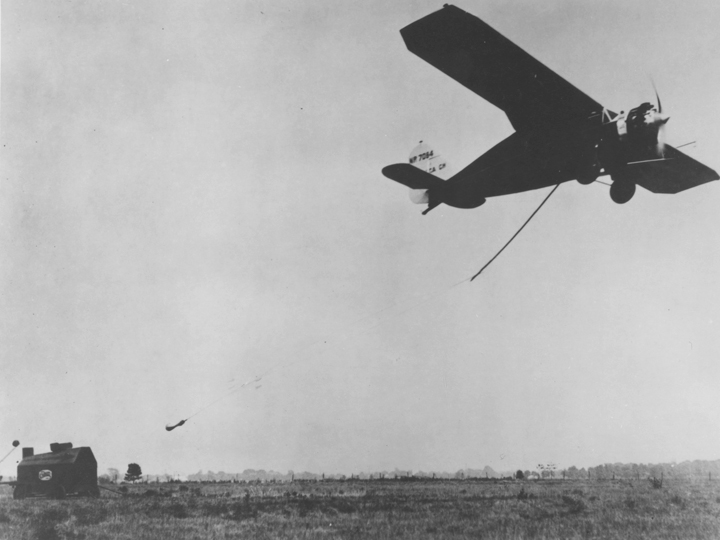 photo of Stinson airmail pick-up operation in action
