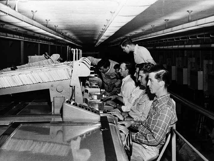 photo of men at mail sorting machines