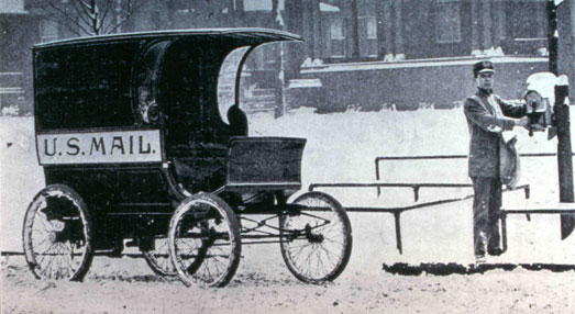 a Winton motorcar and a postal carrier