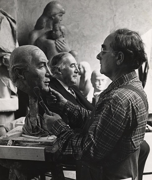 photo of William Zorach working on a bust (1948)