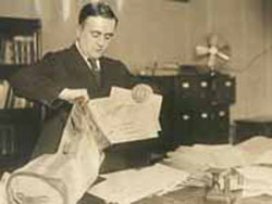 A man putting airmail into bags