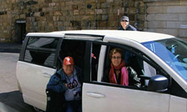 Docents loading the van