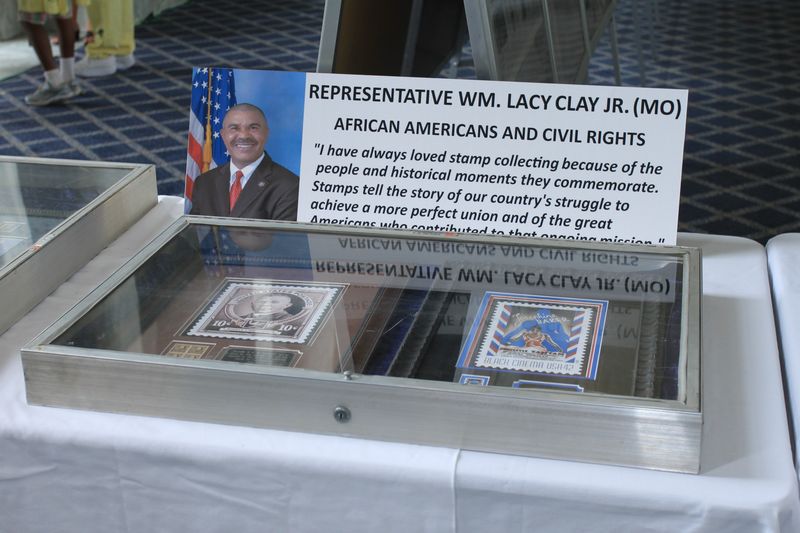A display case featuring an African American stamp design and a Civil Rights stamp design.