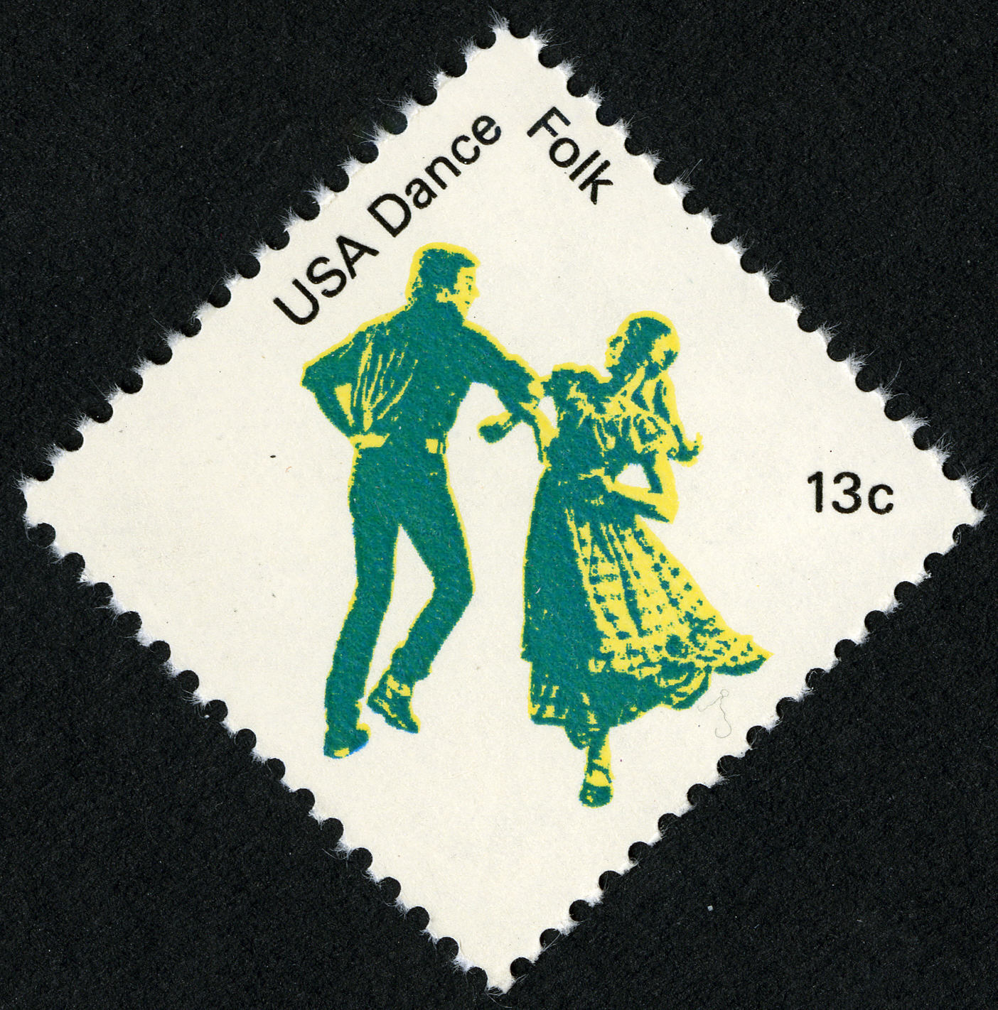 Postage stamp with image of male and female interlinking arms, spinning in dance.