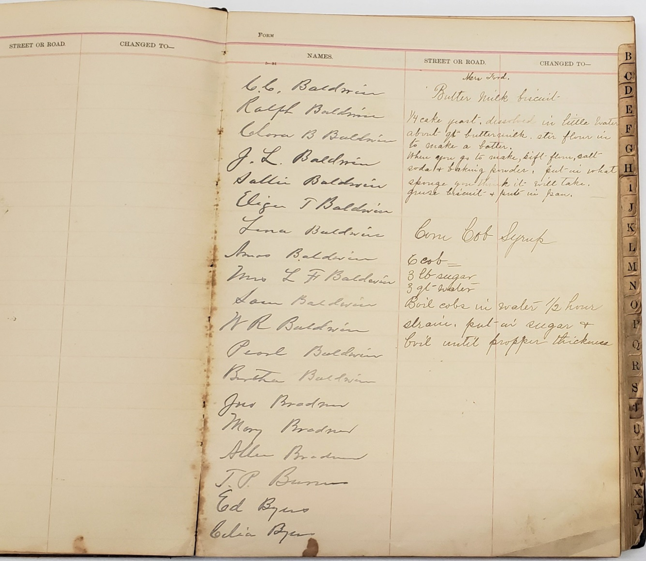 Inside of opened cash book with detailed handwritten records