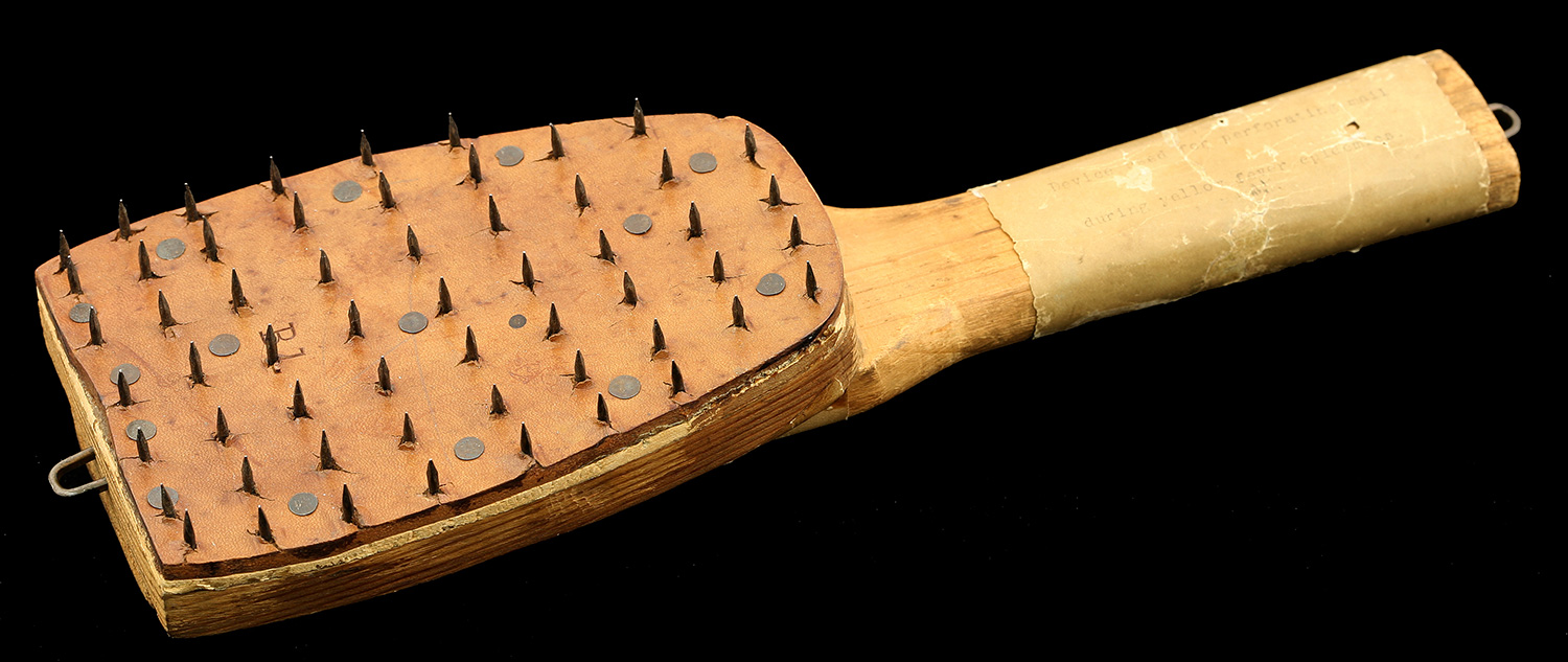 Perforation paddle used to puncture mail