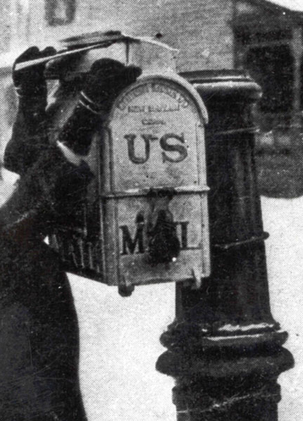 a child putting a letter into a Doremus-style mailbox