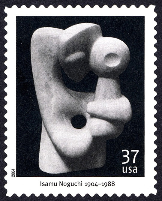 stamp featuring a sculpture resembling a mother holding a child