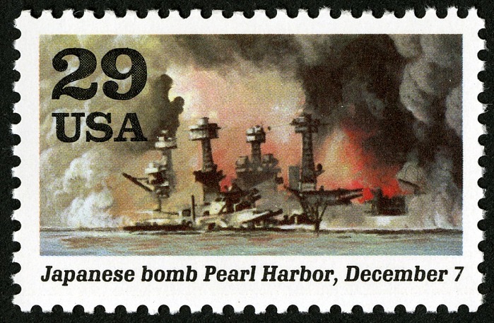 Japanese bomb Pearl Harbor stamp showing a ship in flames