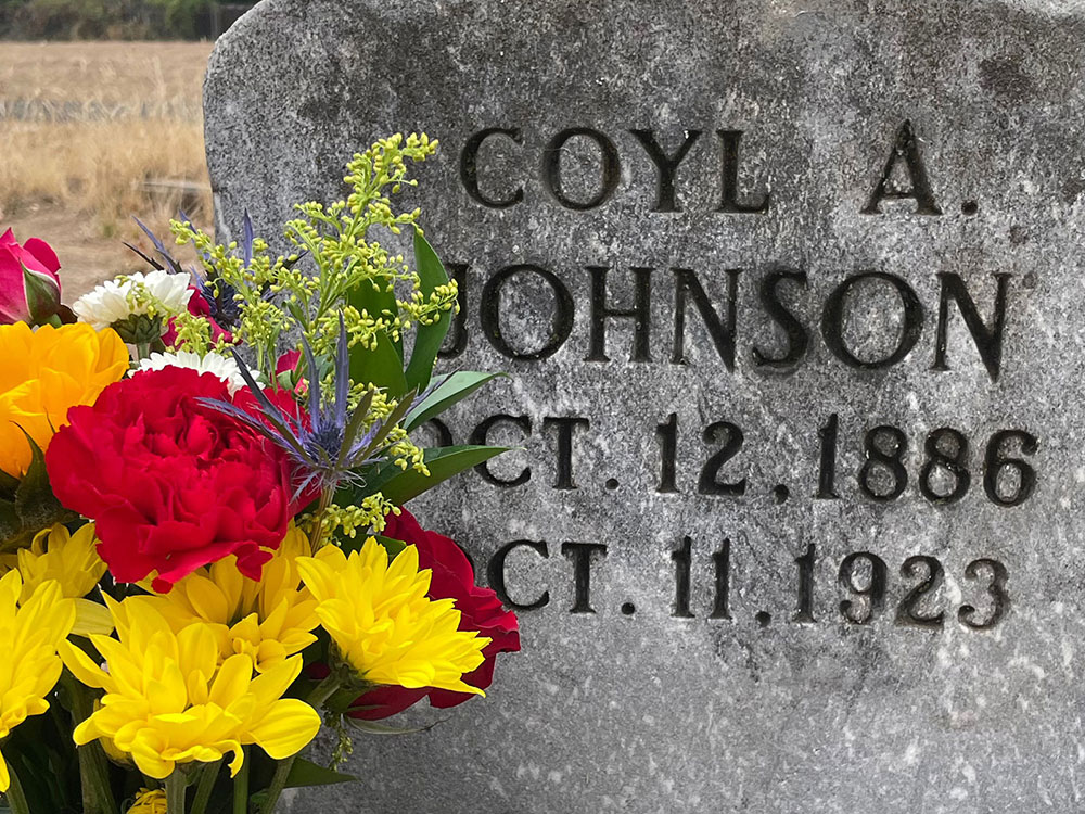 Charles Orin Johnsons gravestone with flowers