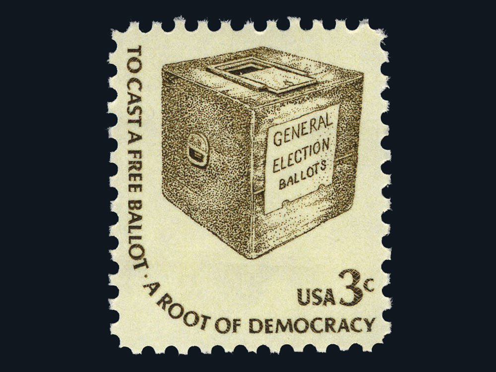 A 1977 postage stamp featuring an illustrated ballot box and the wording “To Cast a Free Ballot – A Root of Democracy.”