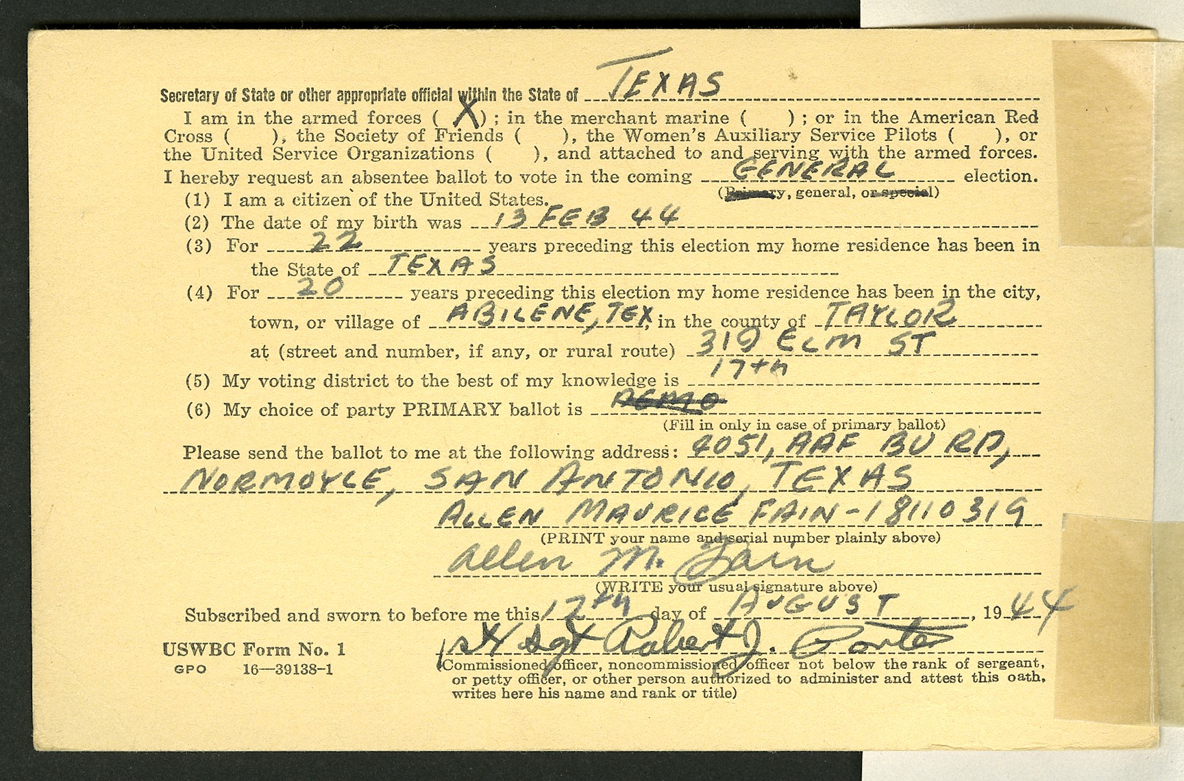 Postcard with printed ballot request form filled-out by hand with black ink.