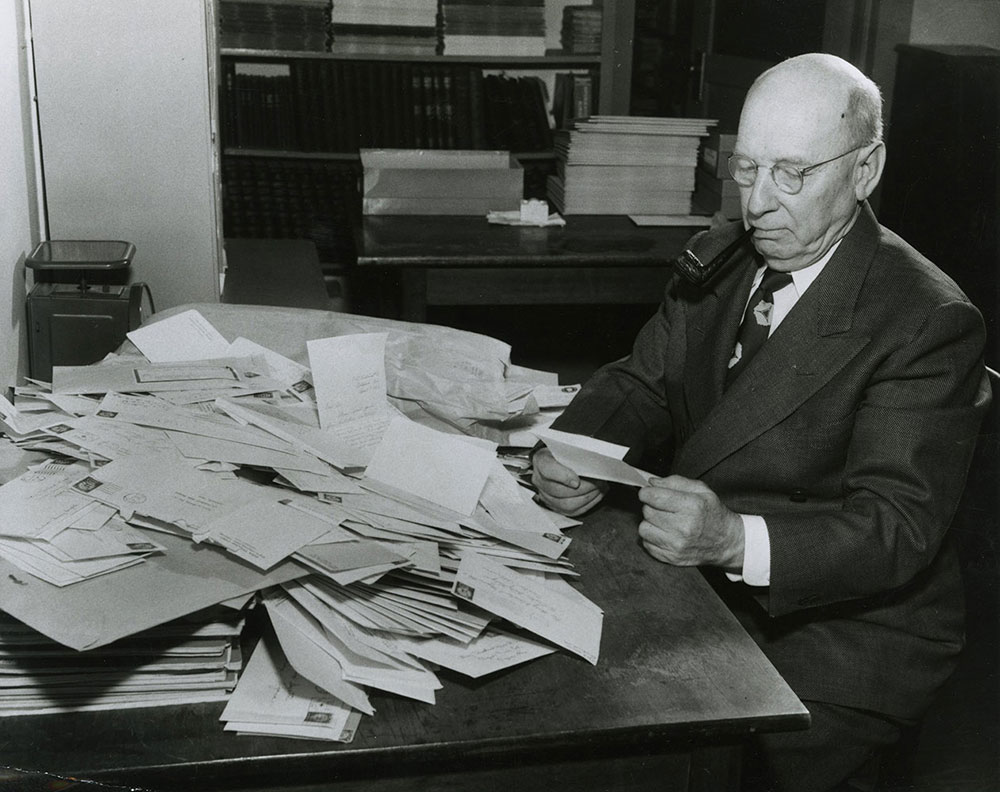 Garry Cleveland Myers, founder and editor, reading mail from children in the early 1950s.