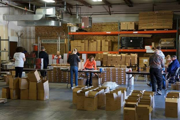 Employees working in a warehouse.