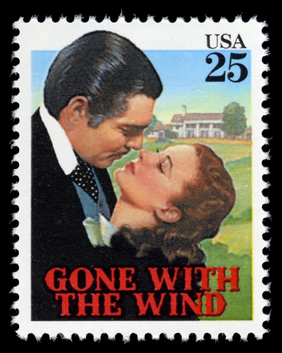 Sello de 25 centavos Lo que el viento se llevó con Clark Gabel y Vivien Leigh, quienes interpretaron a Rhett Butler y Scarlett O'Hara